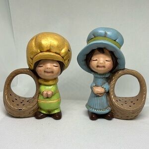 Vintage ceramic hand painted boy and girl standing by basket 4” tall